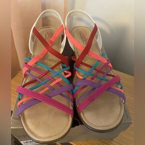 Like new!  Skechers Parallel crossed wires wedges